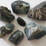 Obsidian nugget surrounded by blue slag