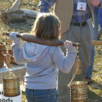 Child carrying a sap yoke