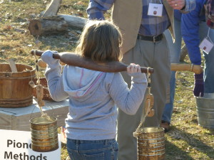 Child carrying a sap yoke