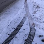 Tire Tracks in Snow.