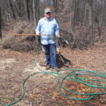 Man with fire safety tools