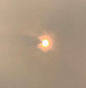 Sun behind smoke