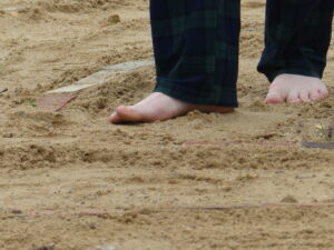 Bare feet on sand