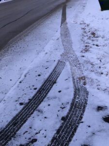 tire tracks in snow.