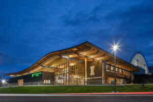 The University of Idaho's ICCU arena glows at night.