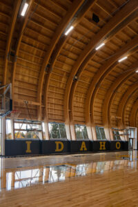 Curved wooden walls of the University of Idaho's new arena