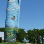 silo painted in prairie motif.