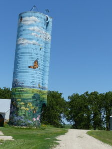 silo painted in prairie motif.