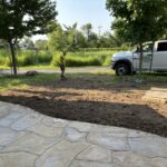 Grading the front lawn.