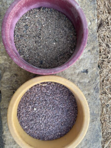 Two types of grit: sand and quartz shards in bowls.