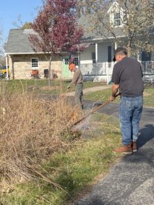 Two men pull fire in labyirnth.