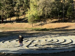 Woman walks labyrinth at ECCO in California